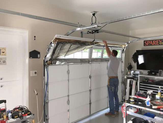 Garage door section replacement by Sunrise Garage Door Repair in Sunrise